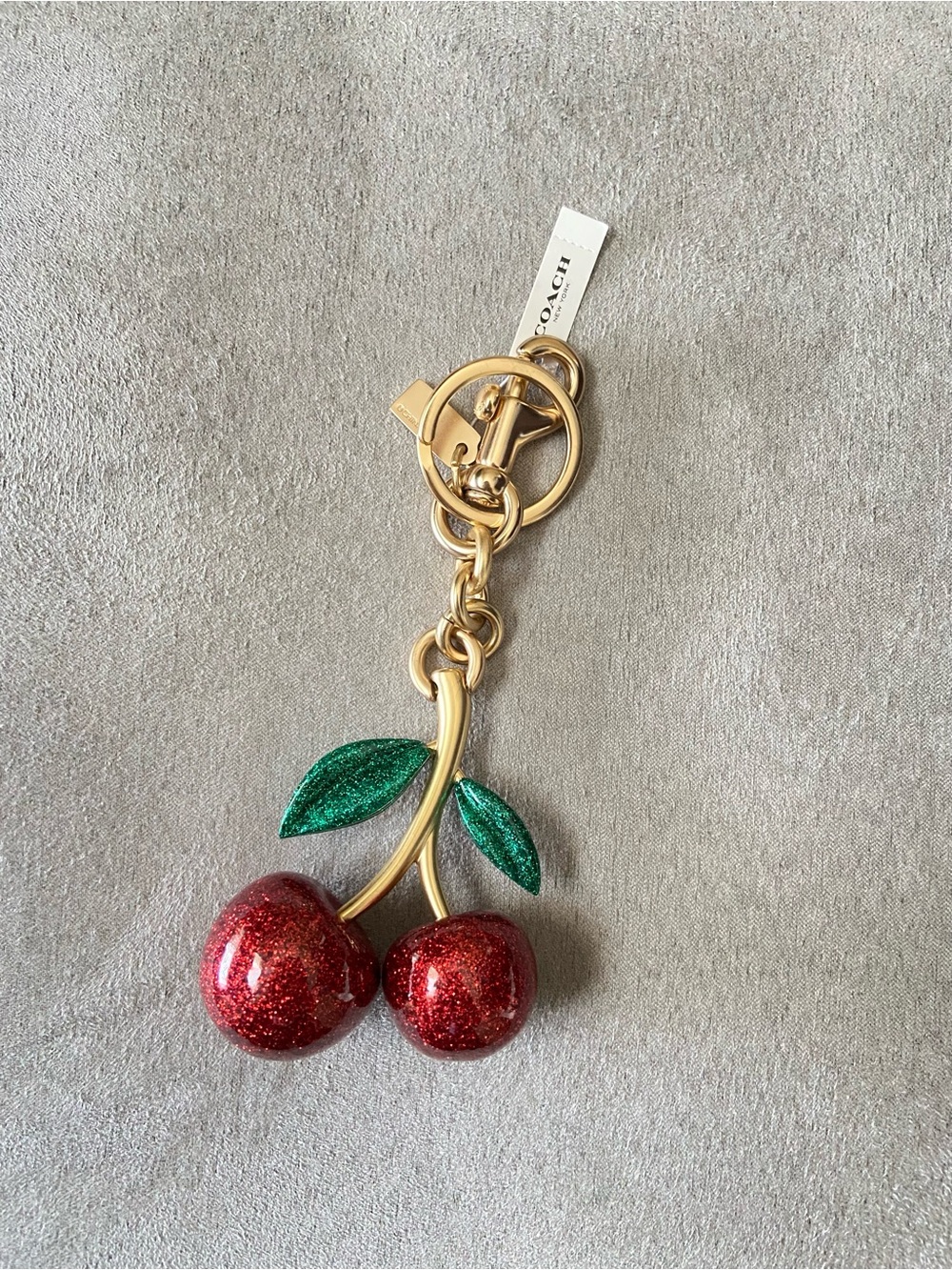 Coach Red Glitter Cherry Keychain with Green Leaves and Gold Hardware